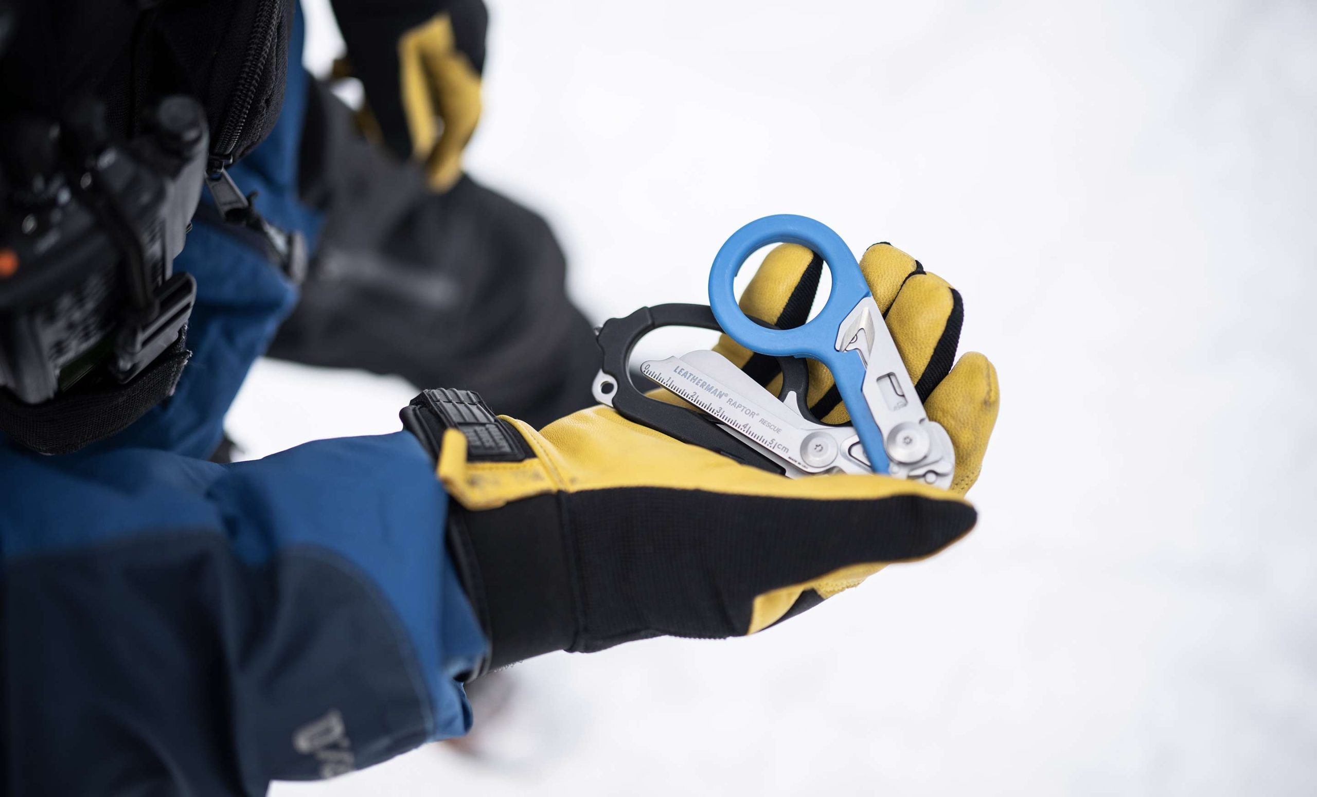 person_holding_raptor_rescue_partially_open_showing_shears_20260402201735.jpg